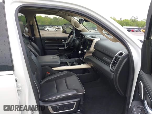 ✅ 2021 Ram 1500 Laramie • VIN: 1C6RREJT1MN709653 • Lot: 41951192. Listed on IAAI with 39,688 mi. Free auction sales archive from the USA and detailed vehicle history report at DreamBid. Image 5.