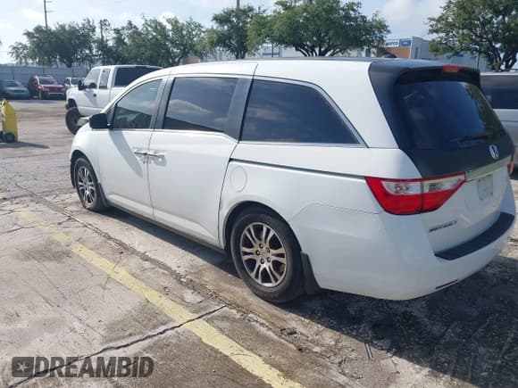 ✅ 2012 Honda Odyssey EX-L • VIN: 5FNRL5H61CB032353 • Lot: 42471691. Listed on IAAI with 186,257 mi. Free auction sales archive from the USA and detailed vehicle history report at DreamBid. Image 3.
