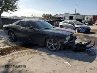 ✅ 2013 Dodge Challenger SXT • VIN: 2C3CDYAG5DH540672 • Lot: 88301915. Wystawiony na Copart z przebiegiem 201 384 mil. Bezpłatny archiwum sprzedaży aukcyjnych z USA i szczegółowy raport historii pojazdu na DreamBid. Zdjęcie 4.