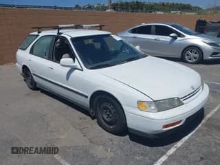 ✅ 1994 Honda Accord LX • VIN: 1HGCE1823RA006801 • Lot: 42396017. Listed on IAAI with 263,415 mi. Free auction sales archive from the USA and detailed vehicle history report at DreamBid. Image 1.