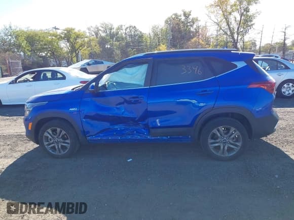 ✅ 2023 Kia Seltos S • VIN: KNDEUCAA1P7458909 • Lot: 43453346. Listed on IAAI with 32,833 mi. Free auction sales archive from the USA and detailed vehicle history report at DreamBid. Image 14.