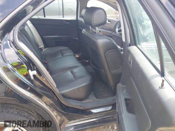 ✅ 2005 Cadillac STS • VIN: 1G6DW677250193123 • Lot: 43024599. Listed on IAAI with 107,824 mi. Free auction sales archive from the USA and detailed vehicle history report at DreamBid. Image 8.