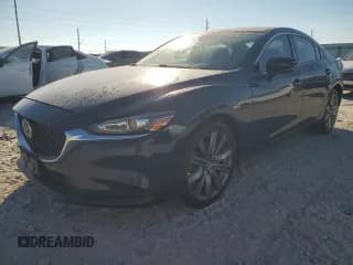 ✅ 2018 Mazda 6 Touring • VIN: JM1GL1VM2J1315871 • Lot: 93269665. Listed on Copart with 102,729 mi. Free auction sales archive from the USA and detailed vehicle history report at DreamBid. Image 1.