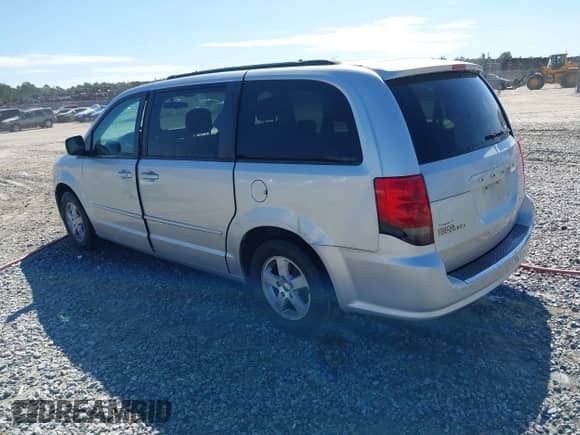 2012 Dodge Grand Caravan SXT z VIN 2C4RDGCG3CR196667, wystawiony jako IAAI lot #43337805 z przebiegiem 167 558 mil mil oraz . Historia ofert i sprzedaży dostępna na DreamBid. Obrazek 3.