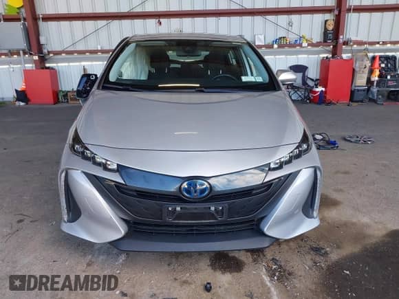 2021 Toyota Prius Limited z VIN JTDKAMFP9M3187986, wystawiony jako IAAI lot #43398563 z przebiegiem 38 772 mil mil oraz . Historia ofert i sprzedaży dostępna na DreamBid. Obrazek 13.