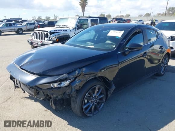 ✅ 2021 Mazda 3 Select • VIN: JM1BPAKL9M1337056 • Lot: 43378295. Wystawiony na IAAI z przebiegiem 112 484 mil. Bezpłatny archiwum sprzedaży aukcyjnych z USA i szczegółowy raport historii pojazdu na DreamBid. Zdjęcie 2.