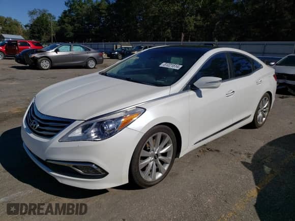 2017 Hyundai Azera Limited с VIN KMHFH4JG0HA581877, выставлен на аукционе Copart как лот 81221514 с пробегом 166 057 миль миль и Списание • Salvage title. История ставок и продаж доступна на DreamBid. Изображение 1.