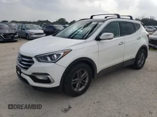 ✅ 2017 Hyundai Santa Fe 2.4L • VIN: 5XYZU3LB4HG398720 • Лот: 53806214. Опубликован ранее на Copart с пробегом 112 487 миль. Бесплатный доступ к архиву аукционных продаж из США и подробный отчёт об истории автомобиля на DreamBid. Изображение 1.