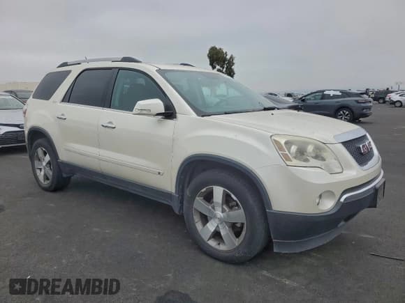 ✅ 2010 GMC Acadia SLT1 • VIN: 1GKLRMED4AJ142888 • Лот: 95901455. Опубликован ранее на Copart с пробегом 140 728 миль. Бесплатный доступ к архиву аукционных продаж из США и подробный отчёт об истории автомобиля на DreamBid. Изображение 4.