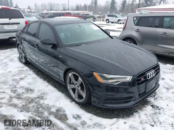 ✅ 2014 Audi S6 • VIN: WAUF2BFC1EN094172 • Lot: 41571238. Listed on IAAI with 62,028 mi. Free auction sales archive from the USA and detailed vehicle history report at DreamBid. Image 1.