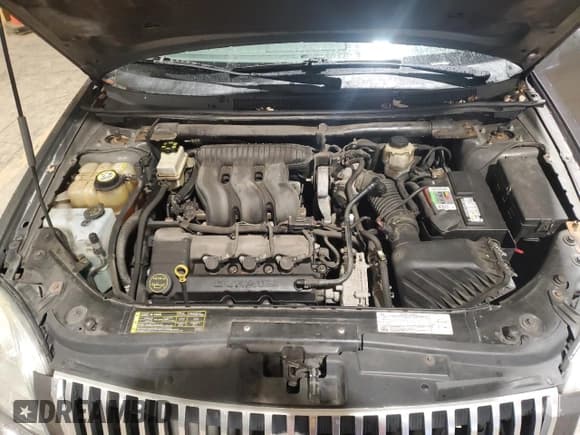 ✅ 2006 Mercury Montego • VIN: 1MEHM40176G614372 • Лот: 81798064. Опубликован ранее на Copart с пробегом Не указан. Бесплатный доступ к архиву аукционных продаж из США и подробный отчёт об истории автомобиля на DreamBid. Изображение 11.