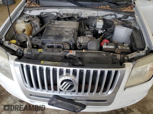 ✅ 2009 Mercury Mariner Premier • VIN: 4M2CU97G49KJ26012 • Lot: 68007975. Listed on Copart with 153,173 mi. Free auction sales archive from the USA and detailed vehicle history report at DreamBid. Image 12.