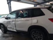 ✅ 2023 Honda Passport EX-L • VIN: 5FNYF8H5XPB023040 • Lot: 41904058. Listed on IAAI with 69,834 mi. Free auction sales archive from the USA and detailed vehicle history report at DreamBid. Image 14.