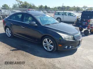 ✅ 2012 Chevrolet Cruze LTZ • VIN: 1G1PH5SC1C7135097 • Лот: 43257887. Опубликован ранее на IAAI с пробегом 129 445 миль. Бесплатный доступ к архиву аукционных продаж из США и подробный отчёт об истории автомобиля на DreamBid. Изображение 1.
