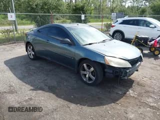 ✅ 2006 Pontiac G6 GTP • VIN: 1G2ZM151764151913 • Лот: 42600396. Опубликован ранее на IAAI с пробегом 197 804 миль. Бесплатный доступ к архиву аукционных продаж из США и подробный отчёт об истории автомобиля на DreamBid. Изображение 1.