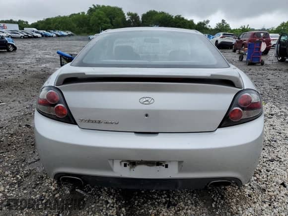 2008 Hyundai Tiburon GS с VIN KMHHM66D68U288062, выставлен на аукционе Copart как лот 58261695 с пробегом 130 310 миль миль и Чистый • Clean title. История ставок и продаж доступна на DreamBid. Изображение 6.