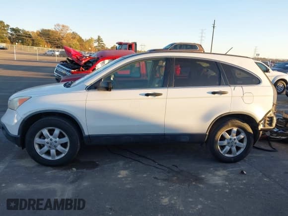 ✅ 2007 Honda CR-V EX • VIN: JHLRE38597C056136 • Lot: 43660143. Listed on IAAI with 185,292 mi. Free auction sales archive from the USA and detailed vehicle history report at DreamBid. Image 14.