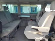 ✅ 2003 Volkswagen EuroVan MV • VIN: WV2MB47023H044047 • Лот: 71014624. Опубликован ранее на Copart с пробегом 189 485 миль. Бесплатный доступ к архиву аукционных продаж из США и подробный отчёт об истории автомобиля на DreamBid. Изображение 11.