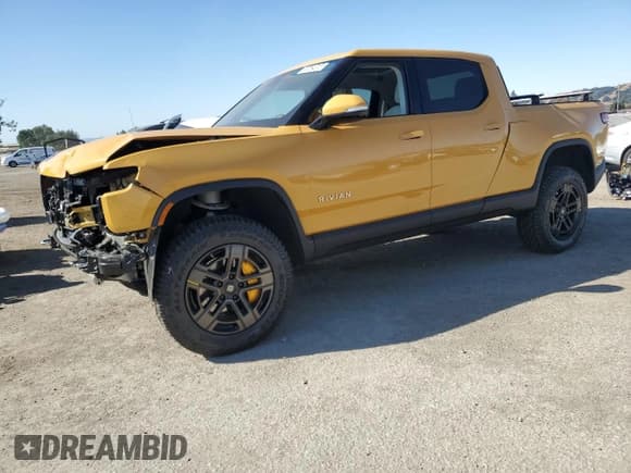 ✅ 2023 Rivian R1T Adventure • VIN: 7FCTGAAA8PN022857 • Lot: 63064315. Listed on Copart with 40,379 mi. Free auction sales archive from the USA and detailed vehicle history report at DreamBid. Image 1.