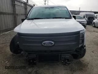 ✅ 2022 Ford F-150 Lightning Pro • VIN: 1FT6W1EV5NWG06529 • Лот: 90594305. Опубликован ранее на Copart с пробегом 49 070 миль. Бесплатный доступ к архиву аукционных продаж из США и подробный отчёт об истории автомобиля на DreamBid. Изображение 5.