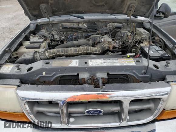 ✅ 1999 Ford Ranger XL • VIN: 1FTZR15V5XPC00431 • Lot: 44642935. Wystawiony na Copart z przebiegiem 190 407 mil. Bezpłatny archiwum sprzedaży aukcyjnych z USA i szczegółowy raport historii pojazdu na DreamBid. Zdjęcie 12.