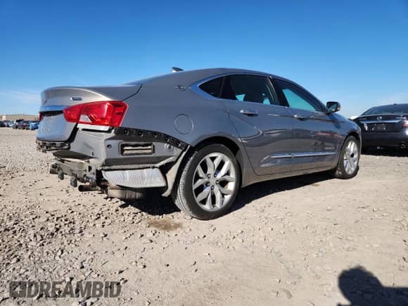 2019 Chevrolet Impala Premier z VIN 1G1105S35KU126237, wystawiony jako Copart lot #90950075 z przebiegiem 103 875 mil mil oraz Szkoda całkowita • Salvage title. Historia ofert i sprzedaży dostępna na DreamBid. Obrazek 3.