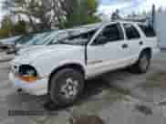 2004 Chevrolet Blazer LS z VIN 1GNDT13X84K162371, wystawiony jako Copart lot #71074684 z przebiegiem 273 070 mil mil oraz Szkoda całkowita • Salvage title. Historia ofert i sprzedaży dostępna na DreamBid. Obrazek 1.