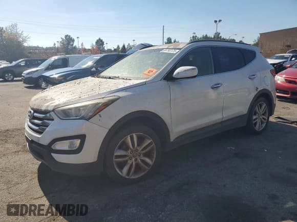 ✅ 2014 Hyundai Santa Fe • VIN: 5XYZUDLA5EG213633 • Лот: 91793175. Опубликован ранее на Copart с пробегом 206 521 миль. Бесплатный доступ к архиву аукционных продаж из США и подробный отчёт об истории автомобиля на DreamBid. Изображение 1.