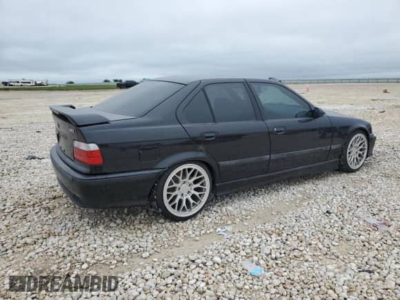1998 BMW 3 Series M3s with VIN WBSCD9320WEE09027, listed as a Copart auction lot 52202055 with 244,452 mi miles and Clean title. Bid and sale history available at DreamBid. Image 3.