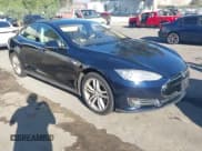 ✅ 2015 Tesla Model S 85 • VIN: 5YJSA1S1XFFP77006 • Lot: 43635423. Listed on IAAI with 94,297 mi. Free auction sales archive from the USA and detailed vehicle history report at DreamBid. Image 1.