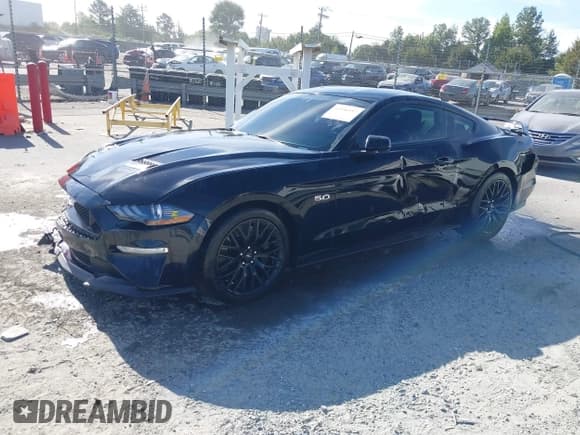 ✅ 2020 Ford Mustang GT • VIN: 1FA6P8CF6L5102727 • Lot: 43356357. Listed on IAAI with 34,552 mi. Free auction sales archive from the USA and detailed vehicle history report at DreamBid. Image 2.