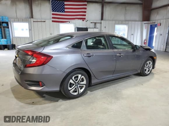 ✅ 2017 Honda Civic LX • VIN: 19XFC2F57HE230542 • Lot: 93558545. Wystawiony na Copart z przebiegiem 49 922 mil. Bezpłatny archiwum sprzedaży aukcyjnych z USA i szczegółowy raport historii pojazdu na DreamBid. Zdjęcie 3.
