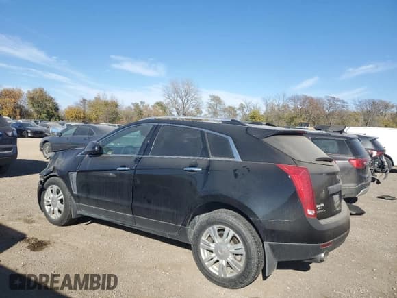 ✅ 2015 Cadillac SRX Luxury Collection • VIN: 3GYFNEE33FS570582 • Lot: 91162095. Wystawiony na Copart z przebiegiem 148 007 mil. Bezpłatny archiwum sprzedaży aukcyjnych z USA i szczegółowy raport historii pojazdu na DreamBid. Zdjęcie 2.