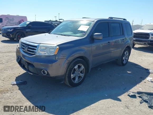 ✅ 2014 Honda Pilot EX-L • VIN: 5FNYF3H72EB015354 • Lot: 43403546. Listed on IAAI with 132,249 mi. Free auction sales archive from the USA and detailed vehicle history report at DreamBid. Image 2.