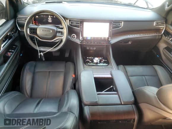 ✅ 2023 Jeep Grand Wagoneer • VIN: 1C4SJVEJ0PS506382 • Lot: 80200684. Listed on Copart with 59,534 mi. Free auction sales archive from the USA and detailed vehicle history report at DreamBid. Image 8.