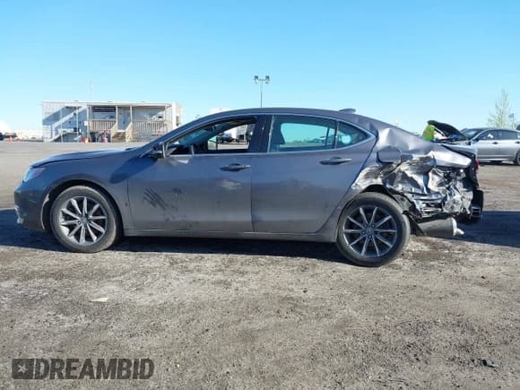 ✅ 2018 Acura TLX • VIN: 19UUB1F31JA011086 • Lot: 42125299. Listed on IAAI with 115,171 mi. Free auction sales archive from the USA and detailed vehicle history report at DreamBid. Image 14.