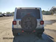 ✅ 2023 Jeep Wrangler Sahara • VIN: 1C4JJXP69PW514683 • Lot: 84743775. Wystawiony na Copart z przebiegiem 72 487 mil. Bezpłatny archiwum sprzedaży aukcyjnych z USA i szczegółowy raport historii pojazdu na DreamBid. Zdjęcie 6.