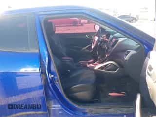 2012 Hyundai Veloster w/Red Int z VIN KMHTC6AD7CU026337, wystawiony jako IAAI lot #43337554 z przebiegiem 132 234 mil mil oraz . Historia ofert i sprzedaży dostępna na DreamBid. Obrazek 5.