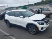 ✅ 2023 Kia Seltos LX • VIN: KNDEPCAA7P7435173 • Lot: 43433136. Listed on IAAI with 32,269 mi. Free auction sales archive from the USA and detailed vehicle history report at DreamBid. Image 13.