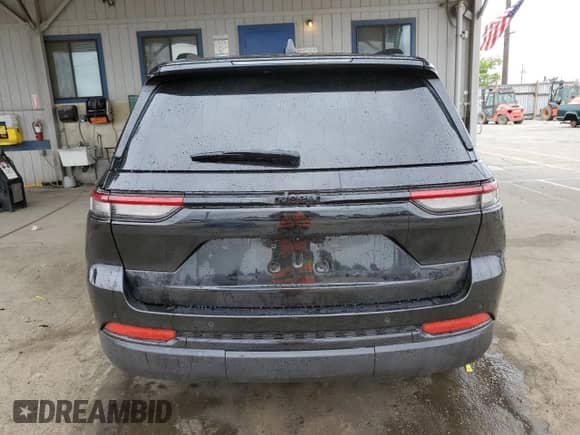 2022 Jeep Grand Cherokee Altitude with VIN 1C4RJGAG7N8584852, listed as a Copart auction lot 53094185 with 13,730 mi miles and Salvage title. Bid and sale history available at DreamBid. Image 6.