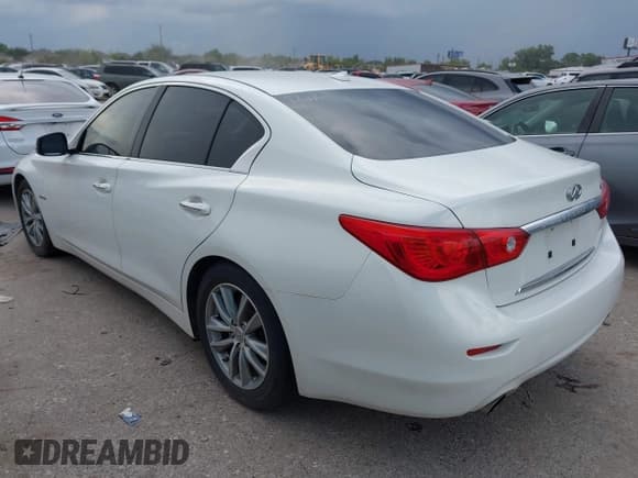 ✅ 2014 Infiniti Q50 Hybrid Premium • VIN: JN1AV7AP0EM691026 • Lot: 43023956. Listed on IAAI with 105,988 mi. Free auction sales archive from the USA and detailed vehicle history report at DreamBid. Image 3.