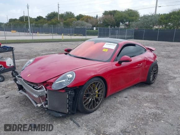 ✅ 2018 Porsche 911 Carrera • VIN: WP0AA2A92JS106143 • Лот: 42009215. Опубликован ранее на IAAI с пробегом 36 754 миль. Бесплатный доступ к архиву аукционных продаж из США и подробный отчёт об истории автомобиля на DreamBid. Изображение 2.