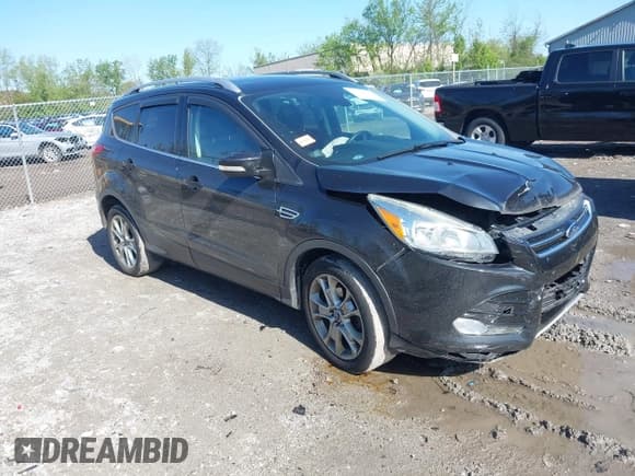 ✅ 2015 Ford Escape Titanium • VIN: 1FMCU0JX5FUC58573 • Lot: 42230339. Listed on IAAI with 109,995 mi. Free auction sales archive from the USA and detailed vehicle history report at DreamBid. Image 1.