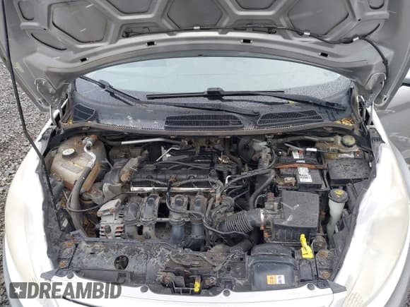 ✅ 2013 Ford Fiesta S • VIN: 3FADP4AJXDM130050 • Lot: 43669628. Wystawiony na IAAI z przebiegiem 105 766 mil. Bezpłatny archiwum sprzedaży aukcyjnych z USA i szczegółowy raport historii pojazdu na DreamBid. Zdjęcie 10.