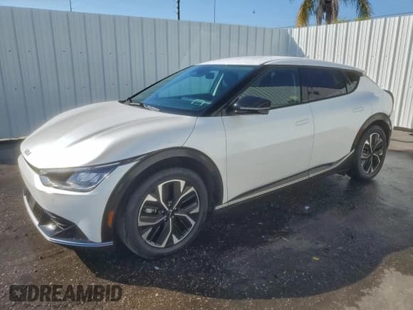✅ 2023 Kia EV6 Wind • VIN: KNDC34LA1P5606260 • Lot: 94031345. Listed on Copart with 52,969 mi. Free auction sales archive from the USA and detailed vehicle history report at DreamBid. Image 1.
