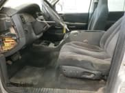 ✅ 2001 Dodge Dakota Sport • VIN: 1B7HG2AN91S325224 • Lot: 87415295. Wystawiony na Copart z przebiegiem 133 967 mil. Bezpłatny archiwum sprzedaży aukcyjnych z USA i szczegółowy raport historii pojazdu na DreamBid. Zdjęcie 7.