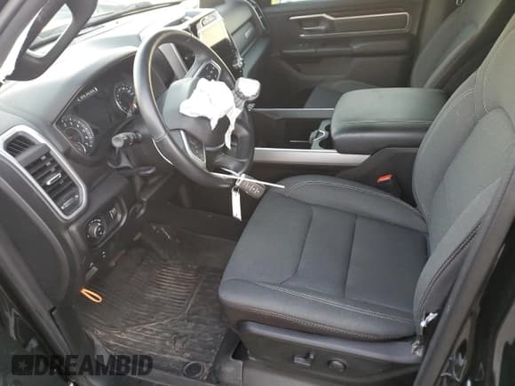 ✅ 2023 Ram 1500 Lone Star • VIN: 1C6SRFMT2PN542811 • Lot: 42945775. Listed on Copart with 33,058 mi. Free auction sales archive from the USA and detailed vehicle history report at DreamBid. Image 7.