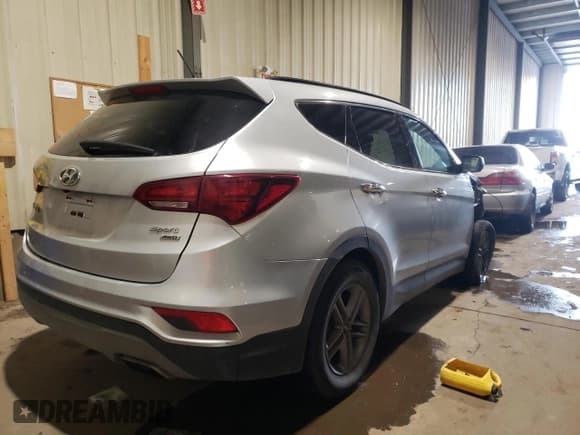 ✅ 2018 Hyundai Santa Fe 2.4L • VIN: 5XYZTDLB6JG553315 • Лот: 38539414. Опубликован ранее на Copart с пробегом 138 433 миль. Бесплатный доступ к архиву аукционных продаж из США и подробный отчёт об истории автомобиля на DreamBid. Изображение 3.