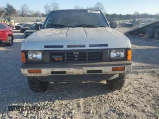 ✅ 1986 Nissan Hardbody E • VIN: 1N6ND16Y0GC394344 • Lot: 86650524. Wystawiony na Copart z przebiegiem 122 949 mil. Bezpłatny archiwum sprzedaży aukcyjnych z USA i szczegółowy raport historii pojazdu na DreamBid. Zdjęcie 5.