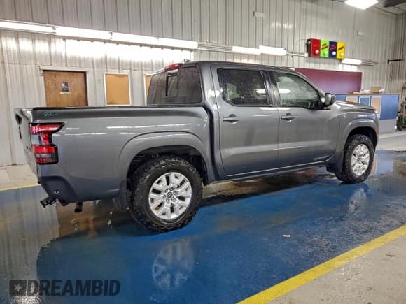 ✅ 2023 Nissan Frontier SV • VIN: 1N6ED1EK6PN656062 • Lot: 94465605. Listed on Copart with 49,626 mi. Free auction sales archive from the USA and detailed vehicle history report at DreamBid. Image 3.